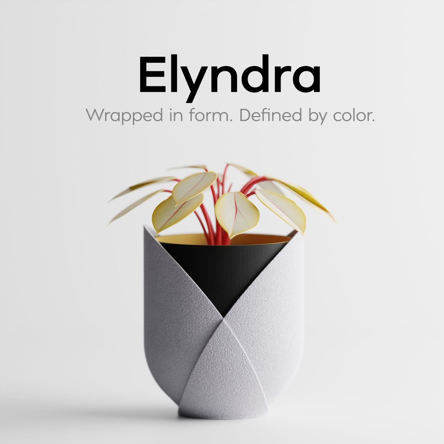 Cache-pot design Elyndra gris clair avec plante tropicale sur fond blanc minimaliste.