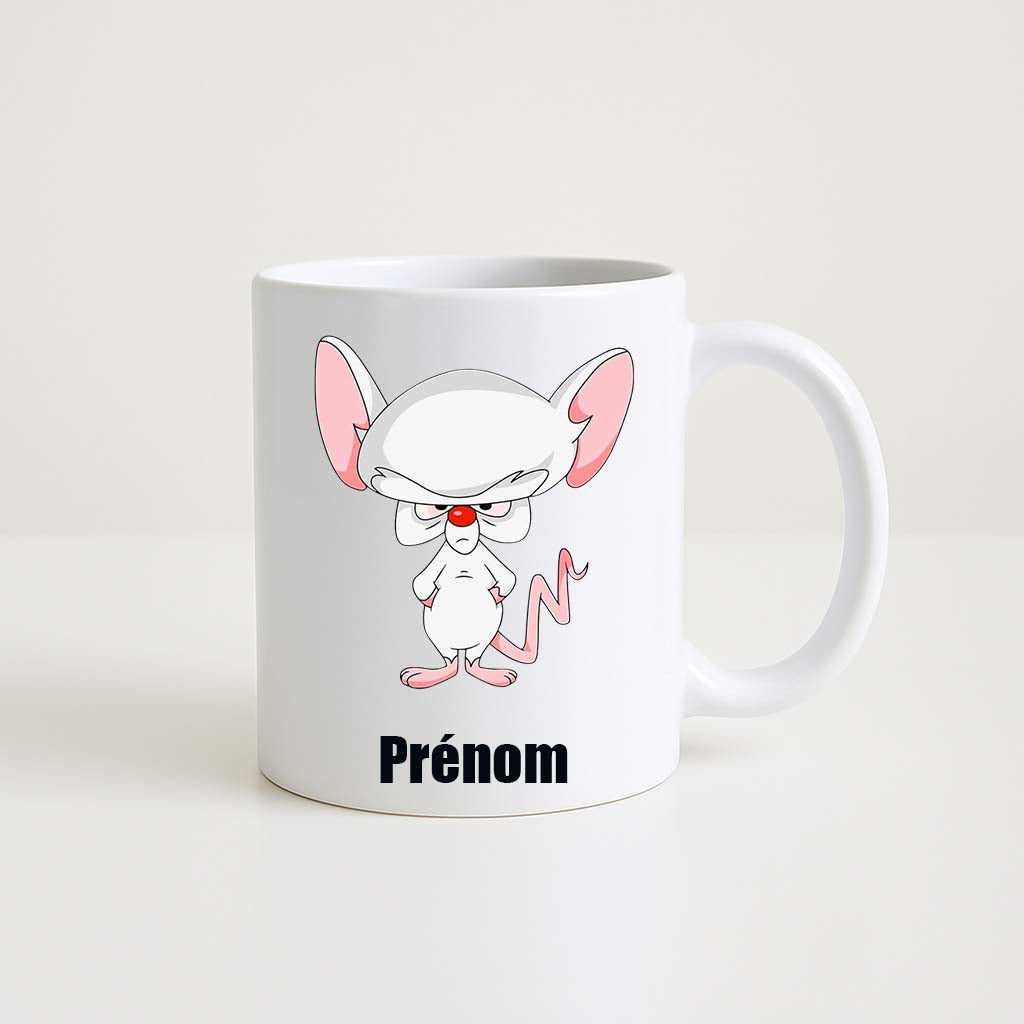 Mug blanc 330ml avec Cortex, souris blanche malicieuse de Minus et Cortex, espace pour un prénom personnalisable.