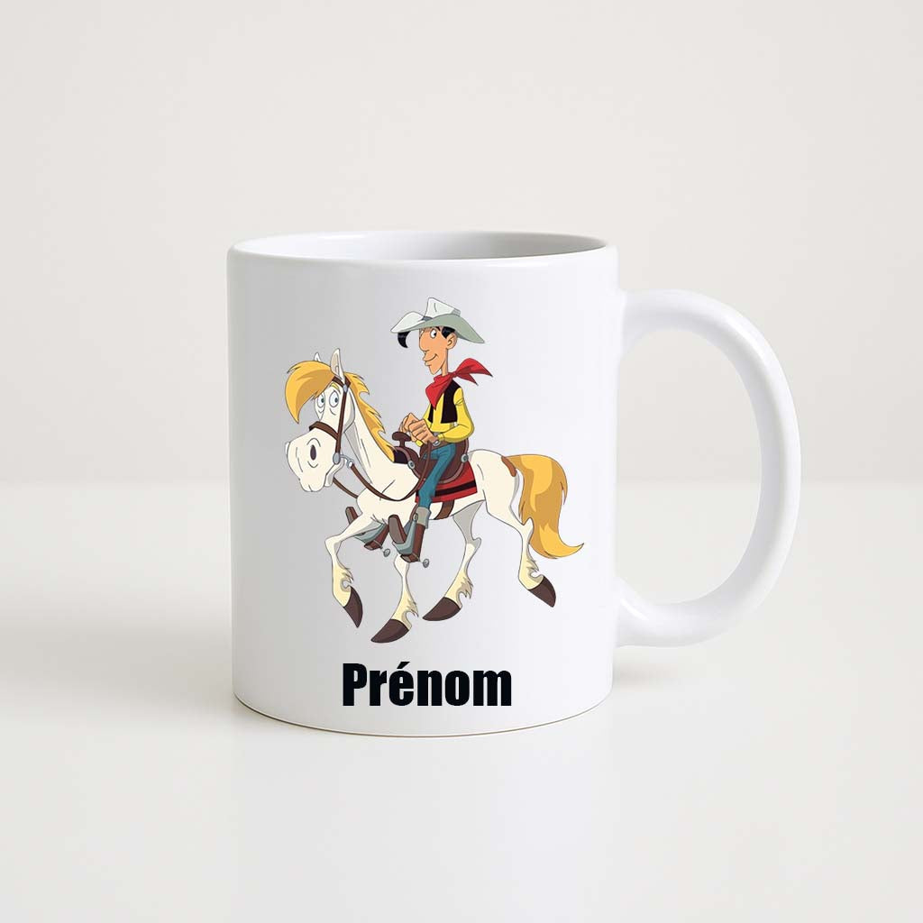 Mug blanc 330ml avec Lucky Luke, cow-boy au chapeau et Jolly Jumper, espace pour un prénom personnalisable.