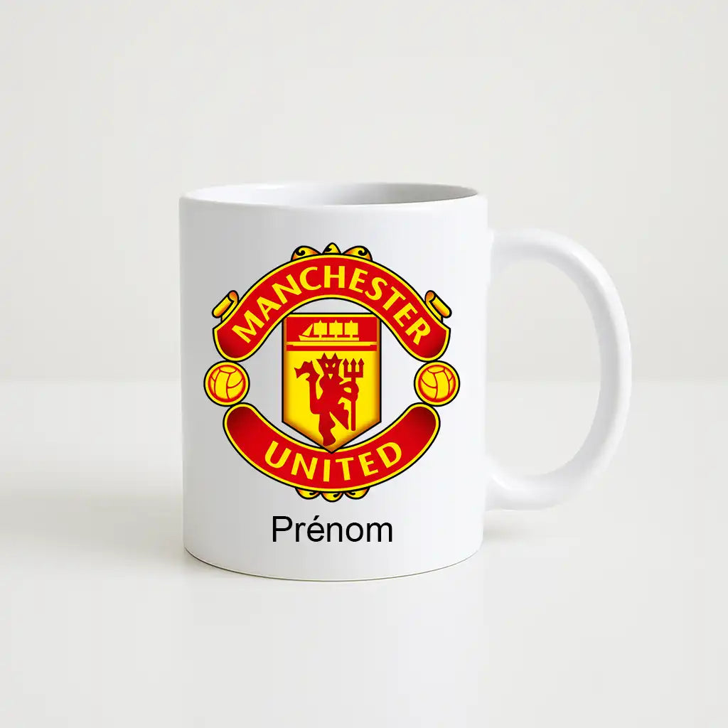 Mug blanc de 330 ml avec le logo du club Manchester United , accompagné de l’inscription "Prénom" personnalisable en dessous.