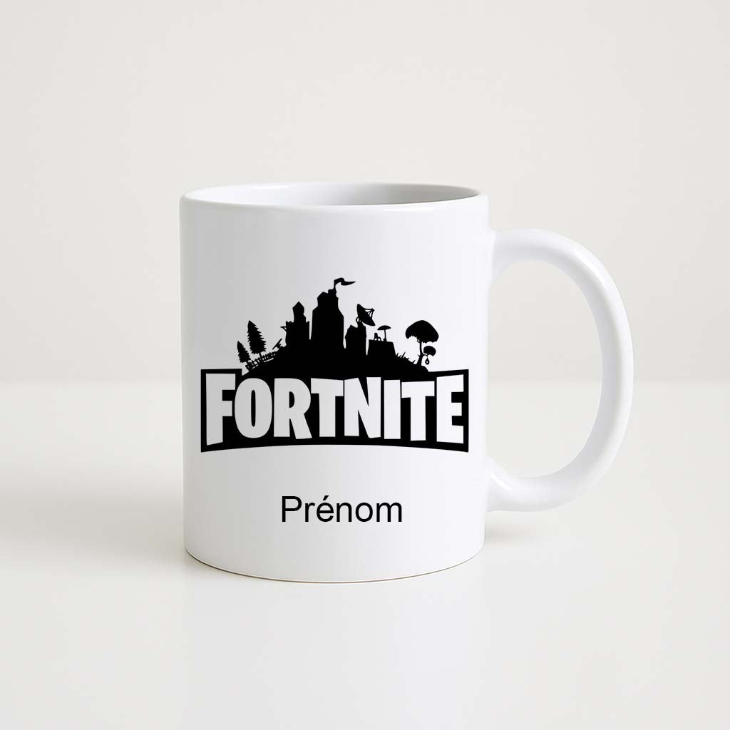 Mug blanc 330 ml avec logo Fortnite noir et espace prénom personnalisable.