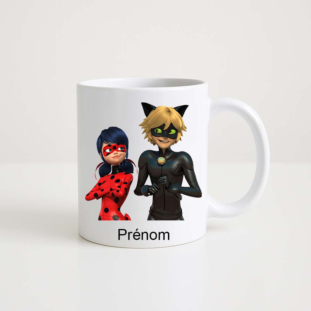 Mug blanc 330 ml Ladybug et Chat Noir Miraculous avec espace prénom personnalisable.