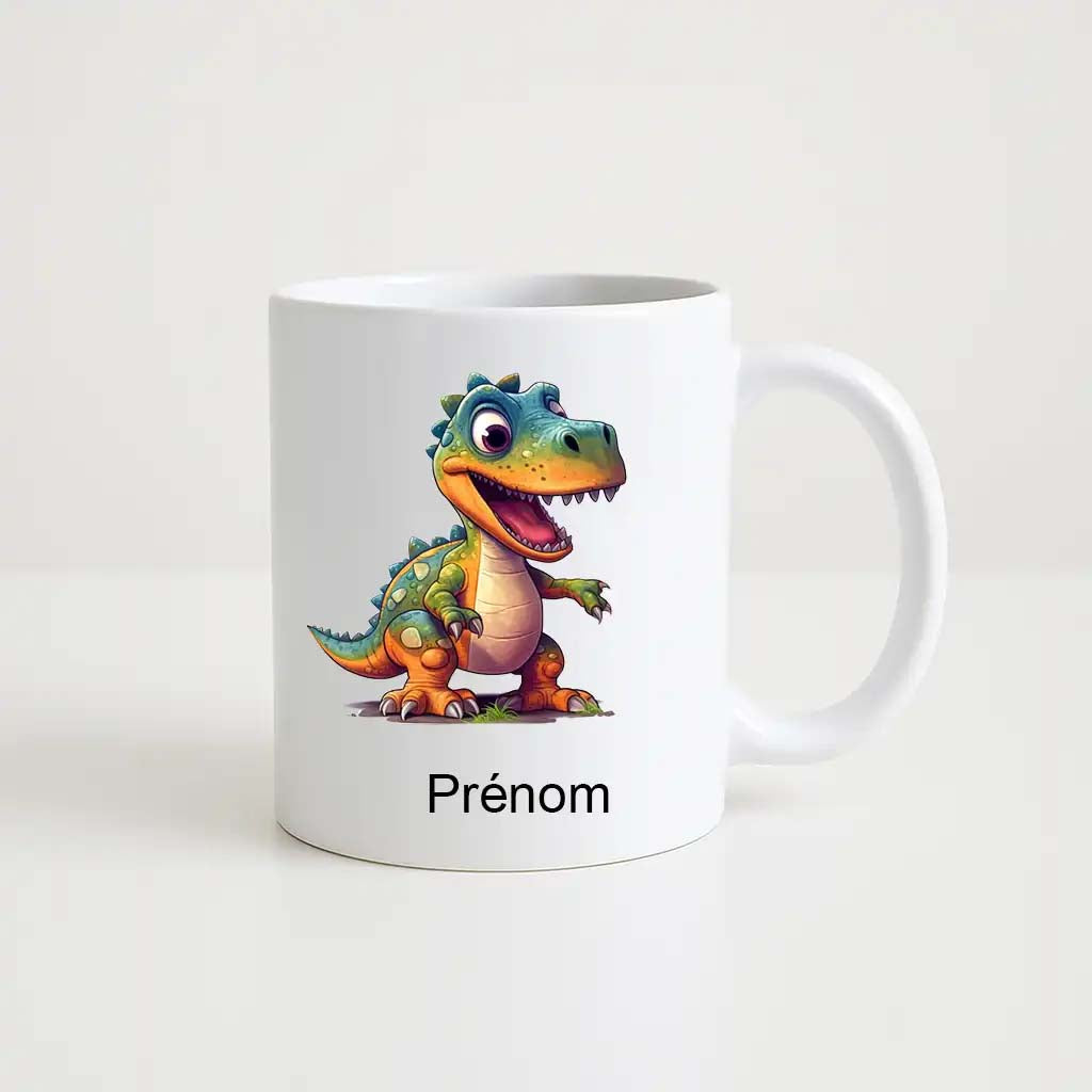 Mug blanc avec un dessin cartoon coloré de dinosaure T-Rex souriant, personnalisable avec un prénom en dessous.