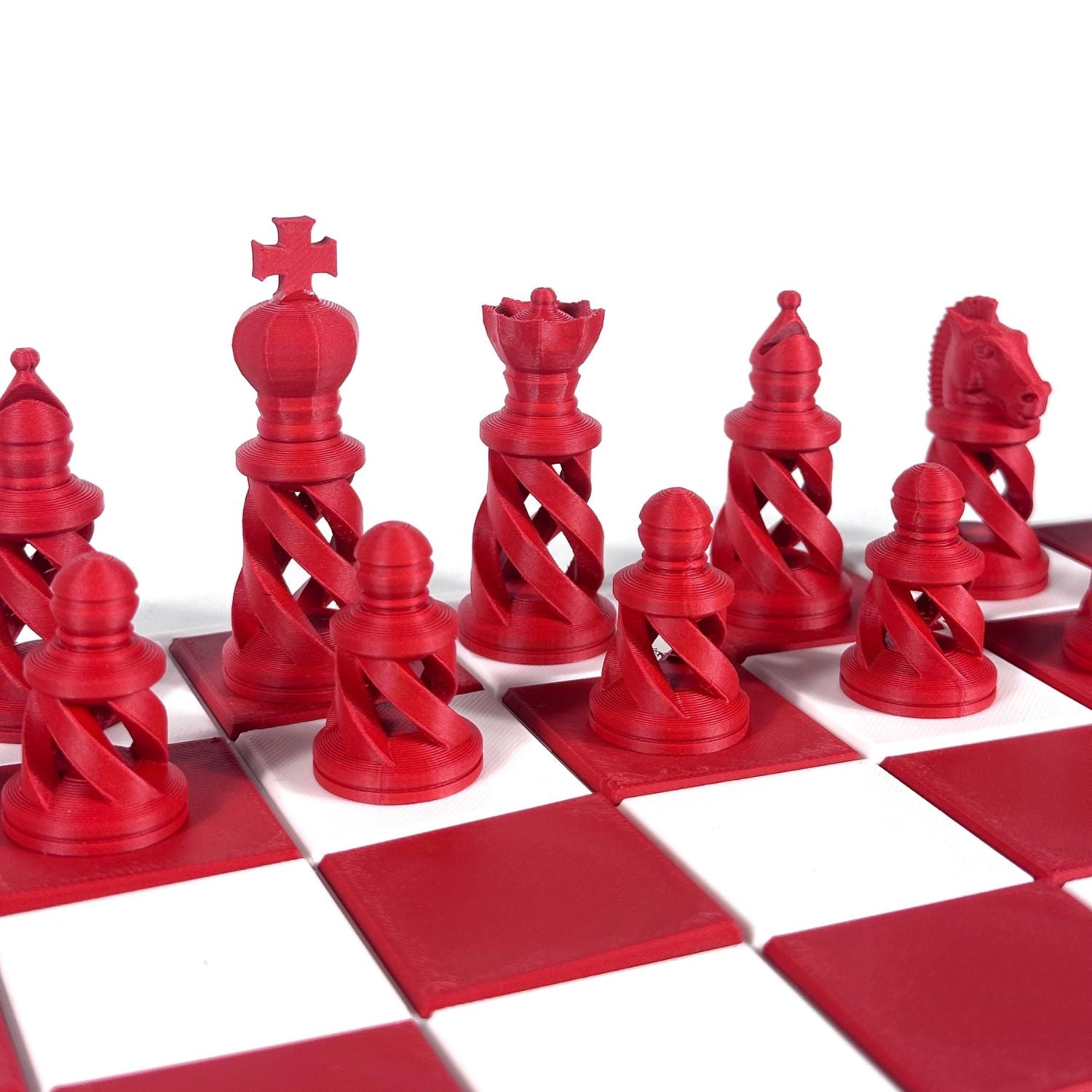 Set d’échecs couleur rouge au design spiralé – cadeau unique pour amateur de stratégie